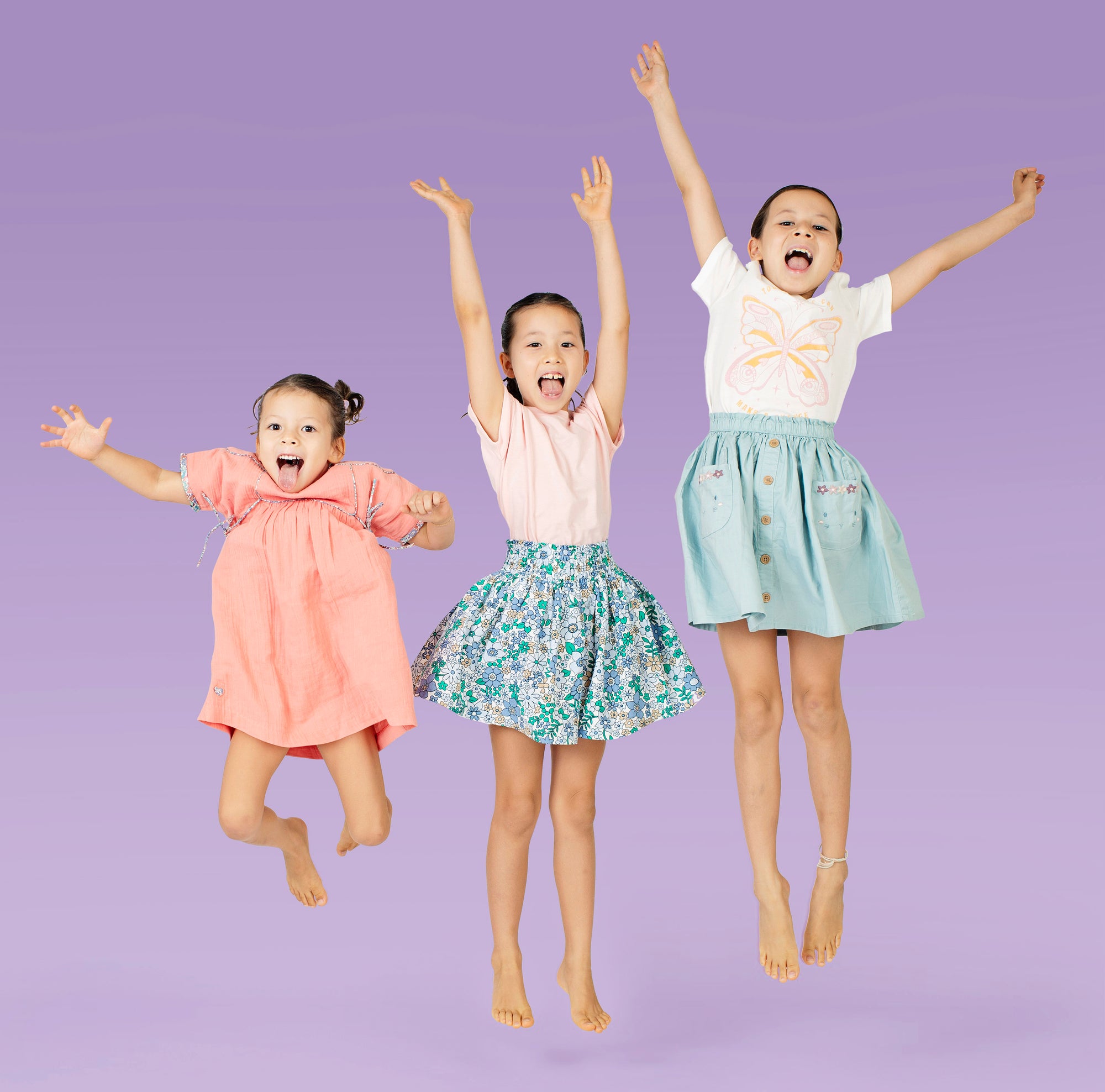 Three girls jumping